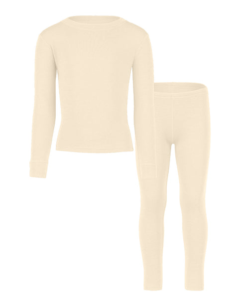 Front view of the kids' menique merino 250gsm two piece set of long sleeve top and pants, in natural color, white background.