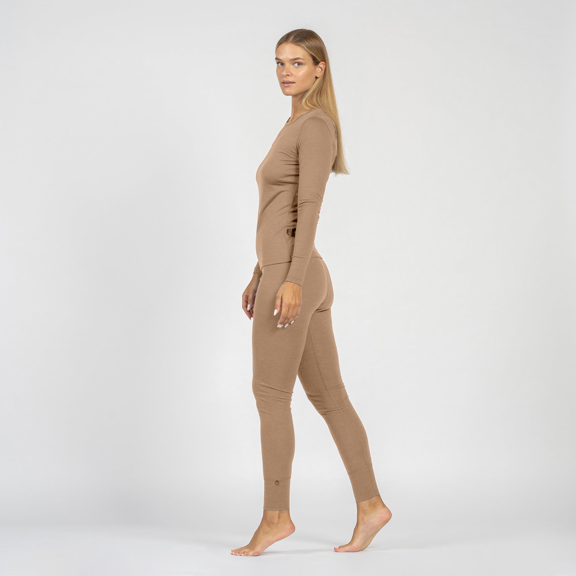 Beige women's bottoms on a white background