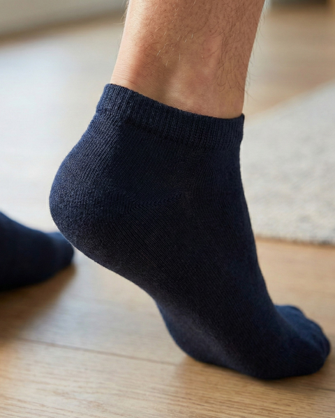 Men’s navy bamboo ankle socks worn on feet, breathable low-cut socks for daily comfort