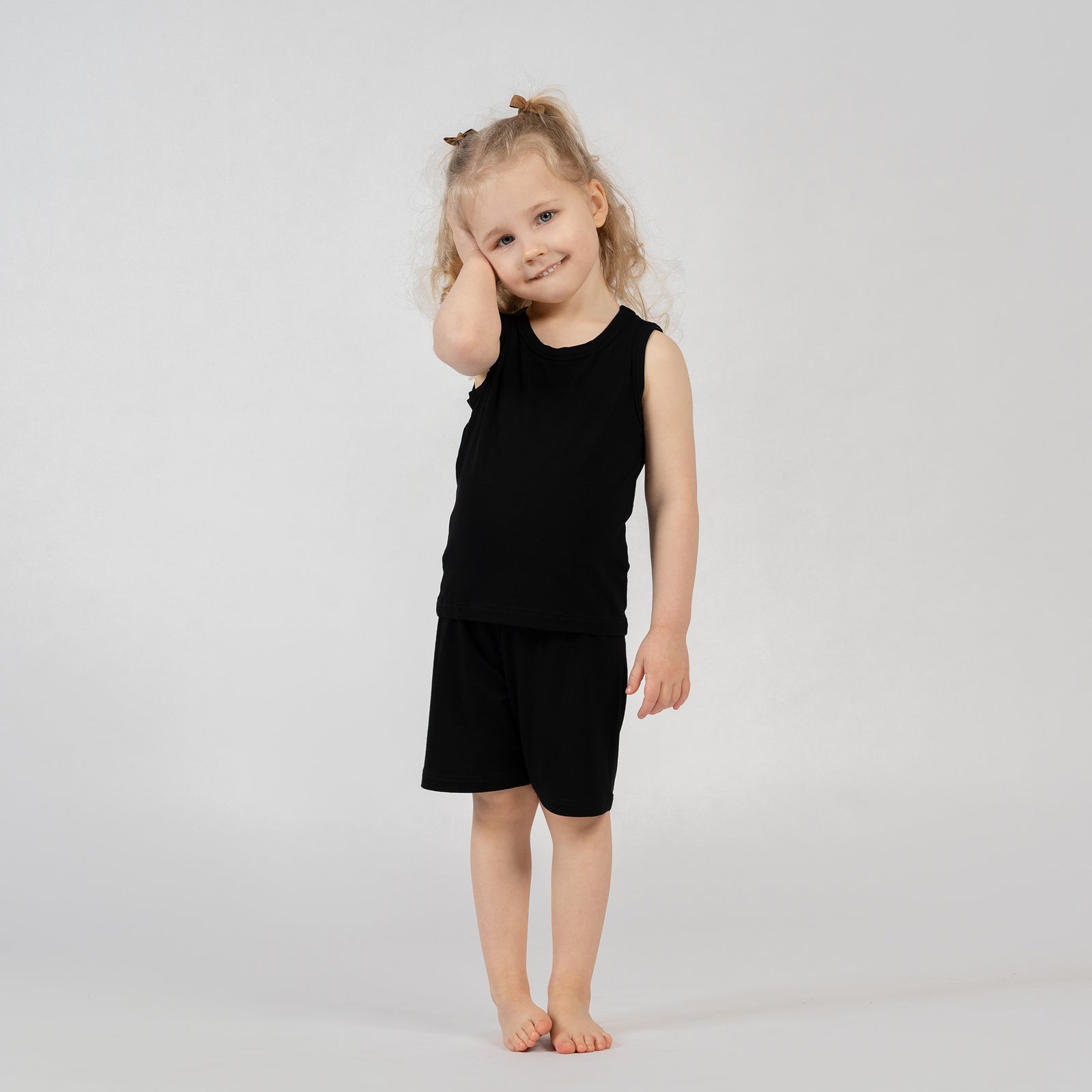 Kids beige bamboo sleeveless top and shorts set, soft and breathable outfit for warm days.