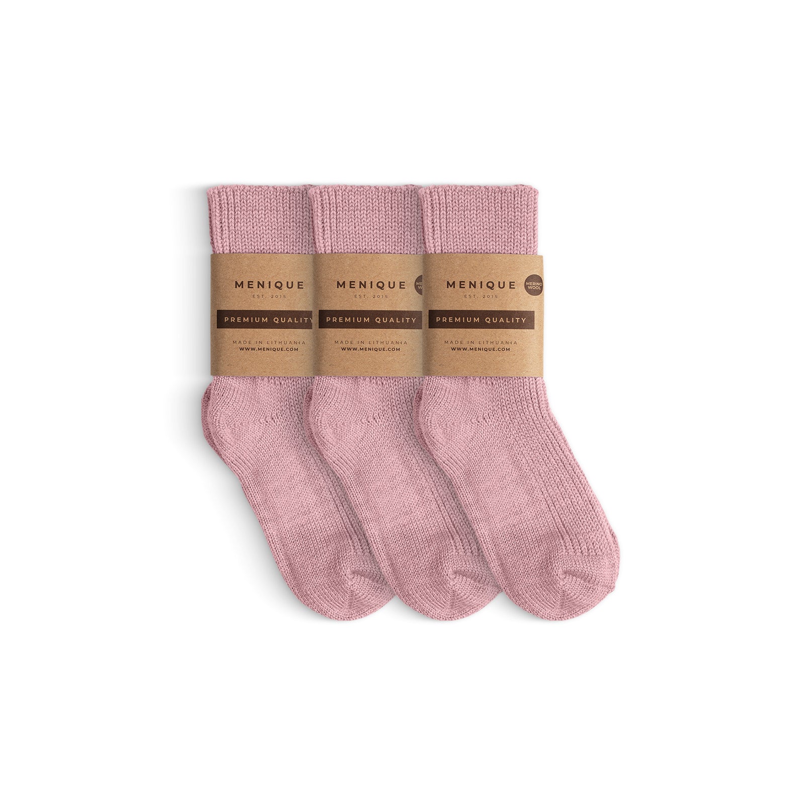 Set of three pairs of beige ribbed thick kids’ socks, each wrapped in a Menique brown paper label marked ‘Premium Quality.