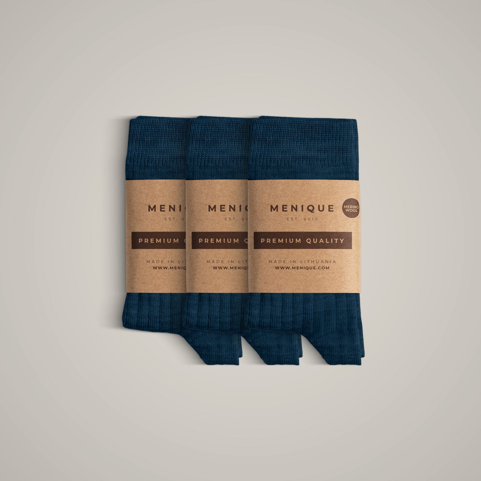 A 3-pack of kids’ pale pink ribbed merino wool socks labeled “Menique Premium Quality.