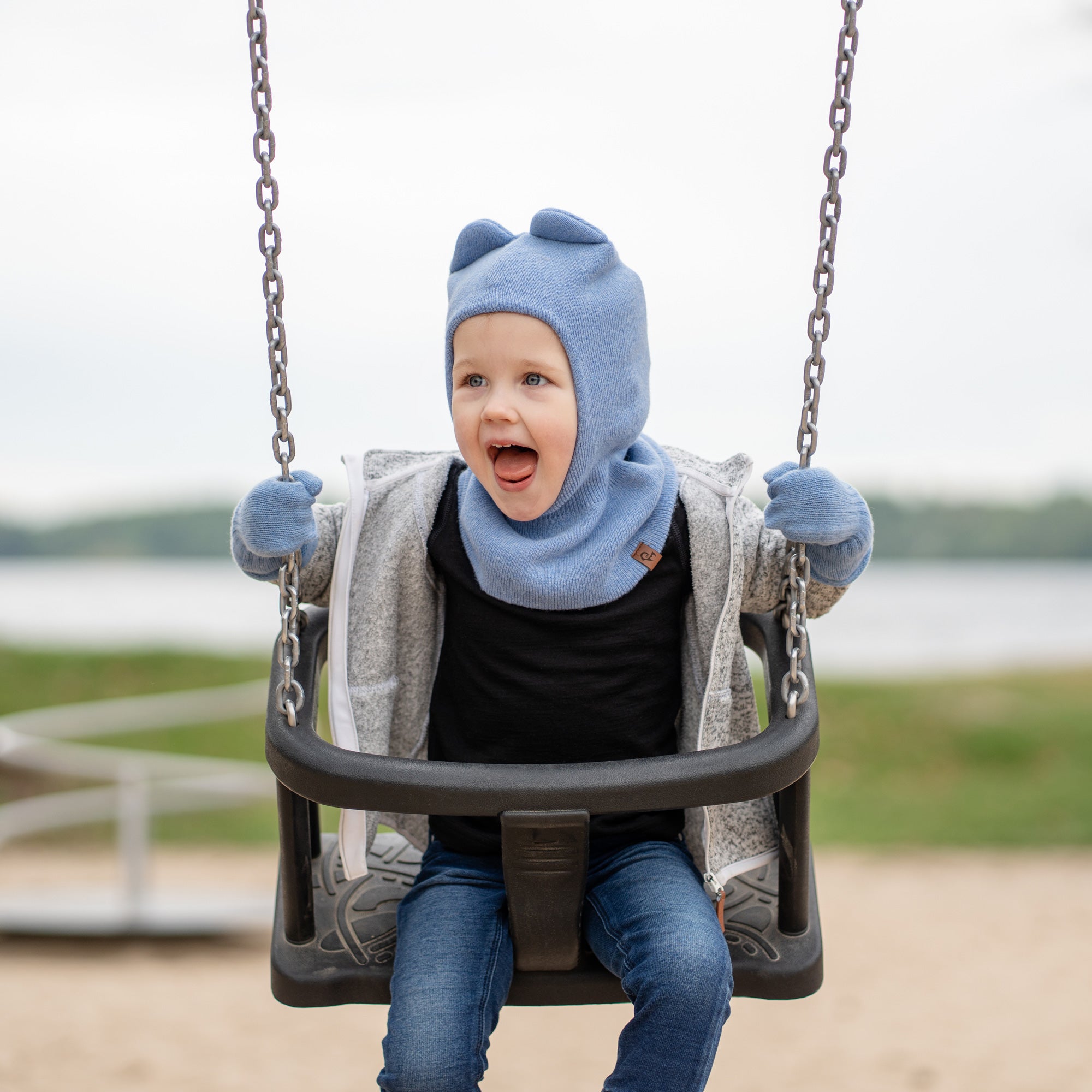 Kids Knitted Balaclava & Mitten's 2-Piece Set in white background