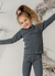 Little girl wearing Merino wool long sleeve top